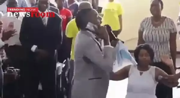 Unbelievable!! Church Members Wowed As Pastor Talks To God On Phone (Watch The Video)